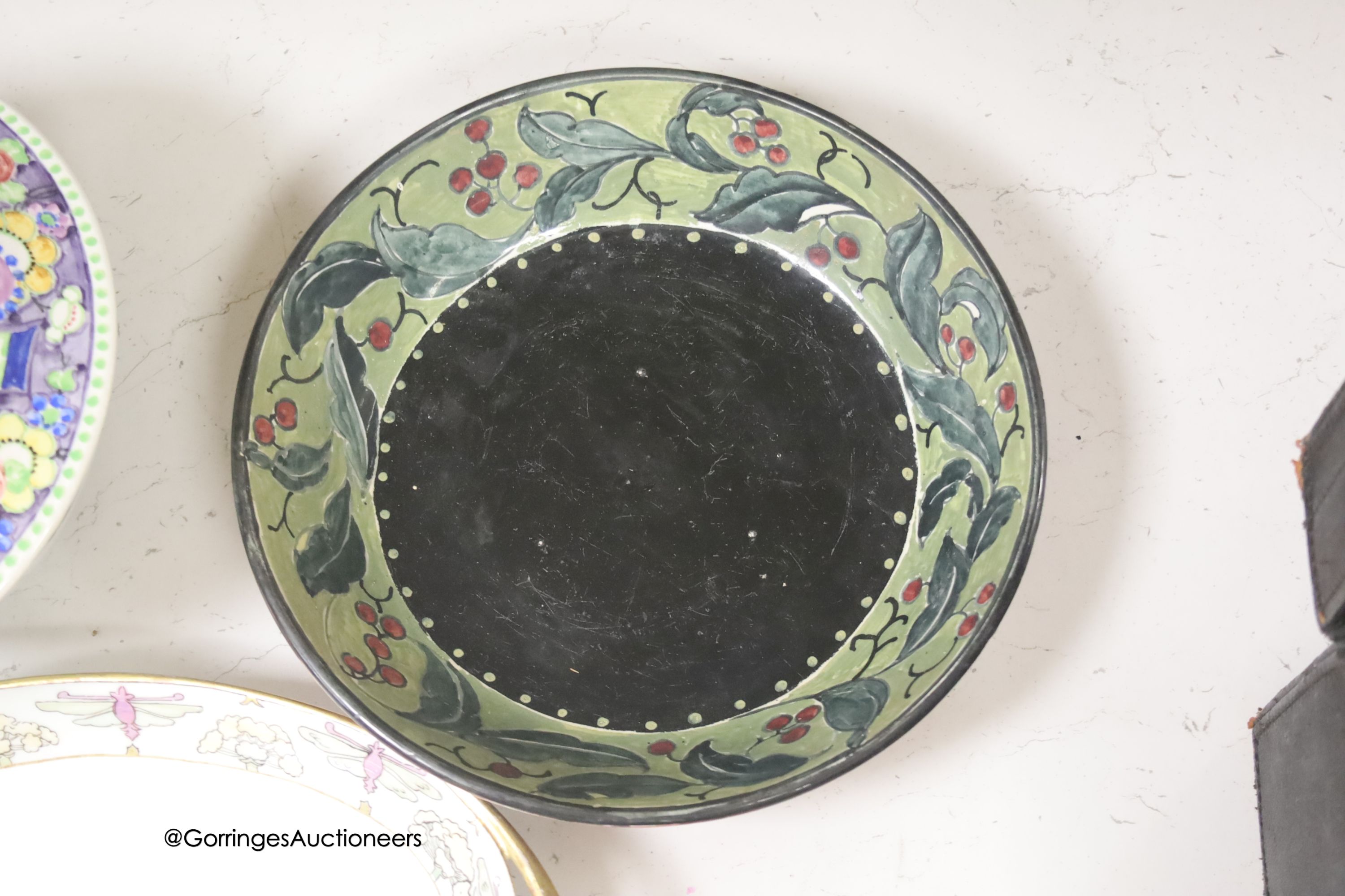Three Scottish art pottery bowls, two signed Bough, one signed Mak Merry, and a Scottish decorated Rosenthal serving dish